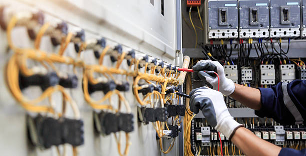 Professional Electrician technician working in East Dennis, MA